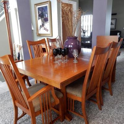Fairmont Designs, Mission Oak Dining Suite. Offers 8 chairs in total 2 with arms, one extra table extension, table pads and a matching...