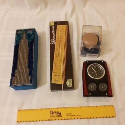 Cribbage, yoyo, clock, Empire State bldg box