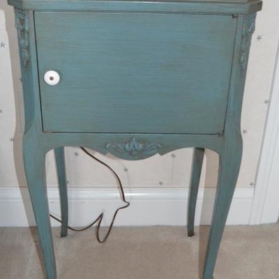 Single door music stand with newer teal painted finish