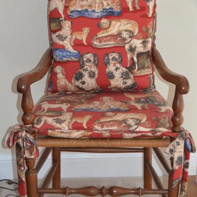 Rush seat wood arm chair with Staffordshire dogs