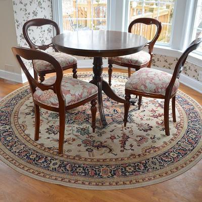 Mahogany round pedestal base table with string inlay and metal paw feet 36