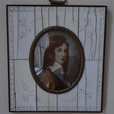 Signed miniature portraits on ivory in original frames