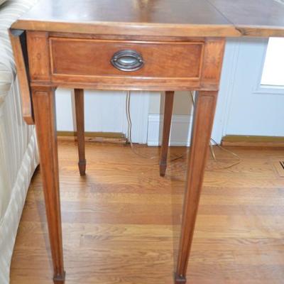 Pair of single drawer mahogany drop side end tables with tapered legs and spade feet