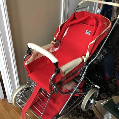 Vintage Emmaljunga red stroller with rain covers, lap blanket, sun shade