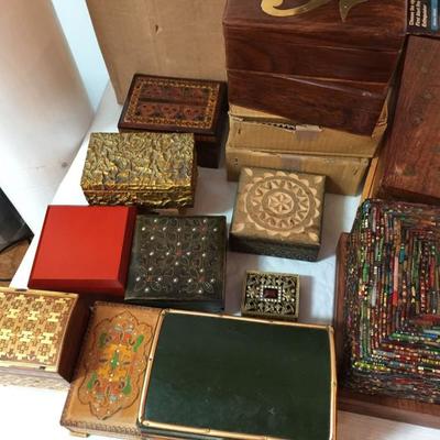 Assorted carved boxes.