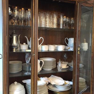 China cabinet and set of Gibson Dinnerware.