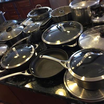 Large selection of calphalon pots and pans.
