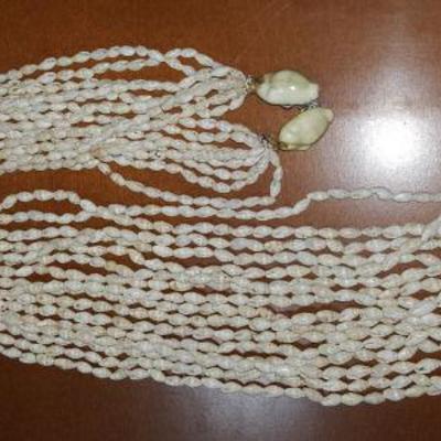 FKT036 Exquisite Eight-Strand Shell Lei with Cowry Shells
