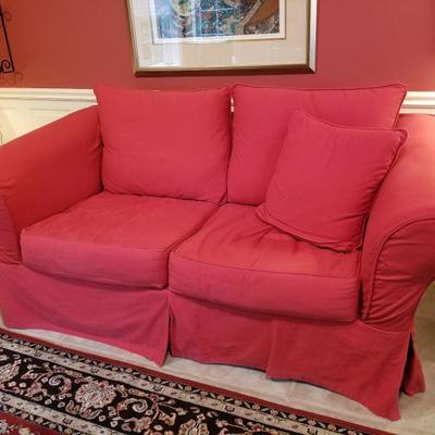 Ballard Designs Vintage Vogue love seat with alternate while slipcover as well as red