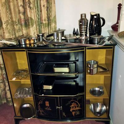 Oriental style bar with lots of great chrome bar ware.
