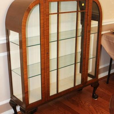 Beautiful Art Deco cabinet with glass shelves, ball and claw feet. Veneer is in good condition
