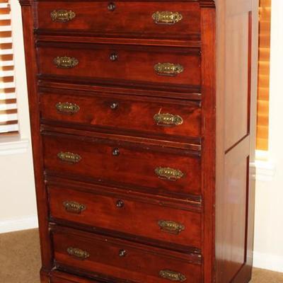 Beautiful antique dresser with six lockable drawers.