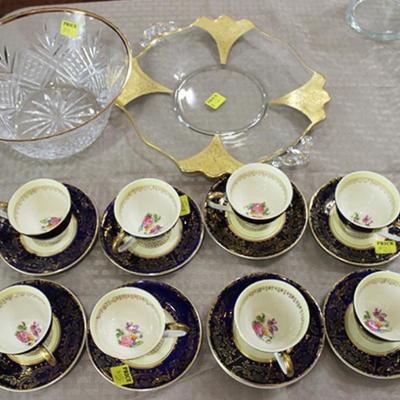 Antique cups and saucers with plate and bowl
