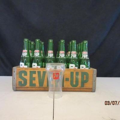 Vintage Seven up soda crate with glass bottles. 