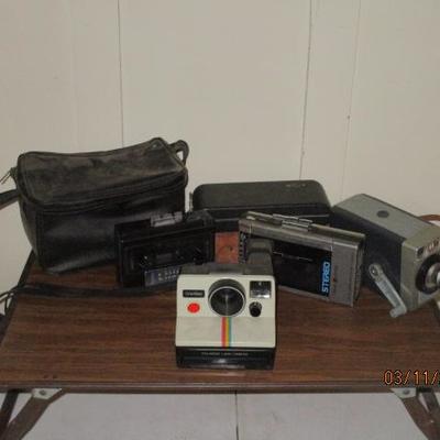 Vintage camera equipment and Polaroid. 
