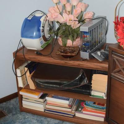 Two shelf bookcase, floral arrangement