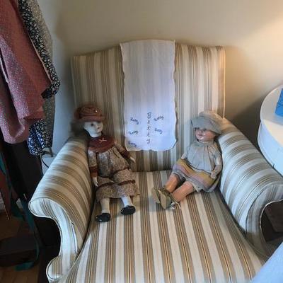 Armchair and dolls.