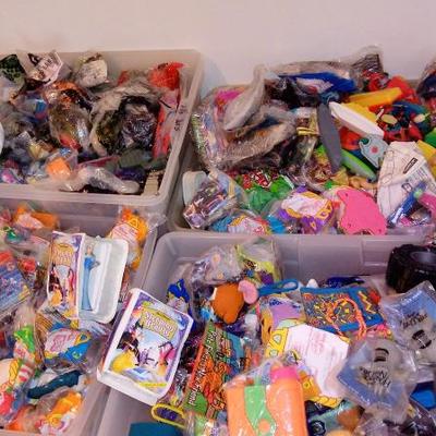 1000s of NIB 1990s-2000 McDonald Happy Meal toys many still in original bags