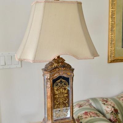 One of a pair of eglomise lamps
