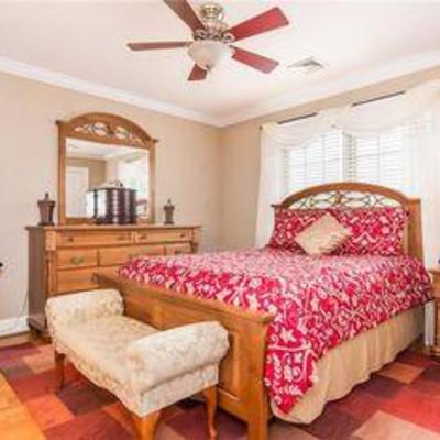 Queen bedroom set in excellent condition.  Solid wood construction. Includes: Queen bed with headboard foot board complete. Dresser with...