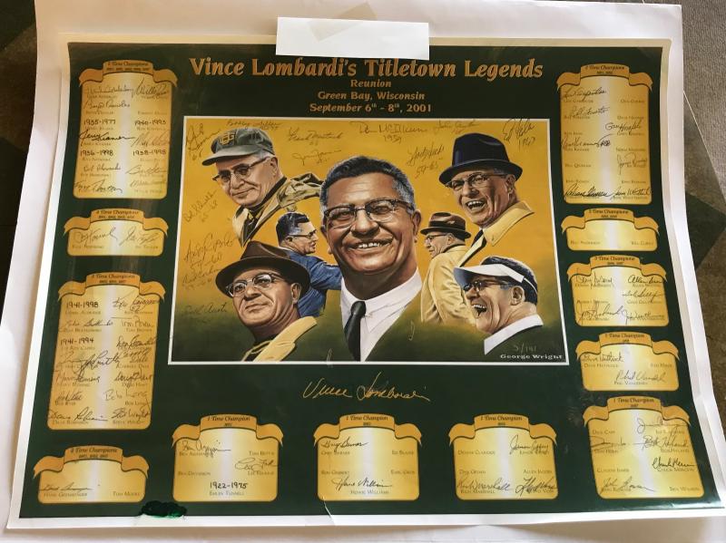 Signed Green Bay Packers place mat, from a reunion held in 2001 in honor of Vince Lombard's Titletown Legends. 
