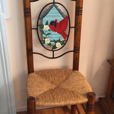 Chair with stain glass back.