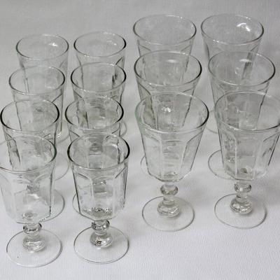 collection of drinking glasses including wine, water, and cordials