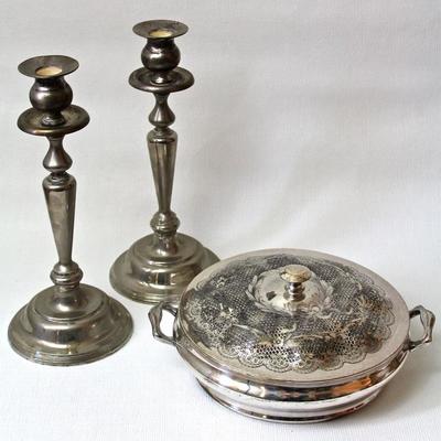 decorative silver plated items, including serving pieces, candlesticks, and flatware