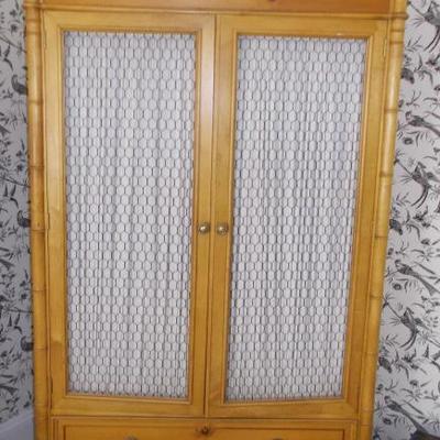 Baker pine and bamboo armoire $1,200
40 X 19 X 83