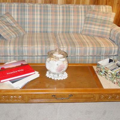sleep sofa, coffee table w/marble, coffee table books, postcards