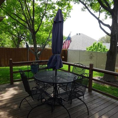 outdoor 4 rocker chairs, umbrella and table
