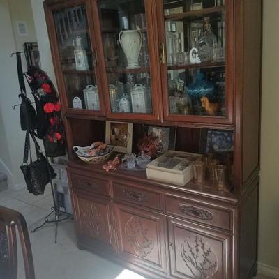 Carved wood Asian china cabinet
