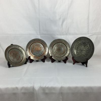 Lot #8
Lot of 4 Middle Eastern Carved Signed Plates