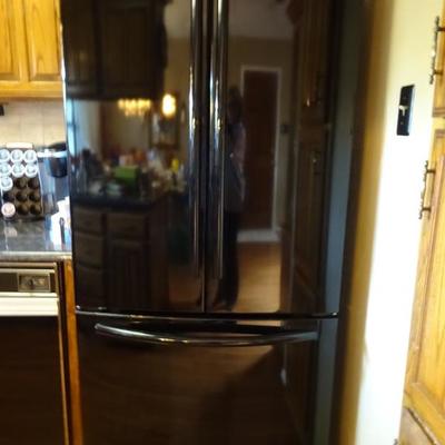 samsung French door refrigerator   less than 2 years old
