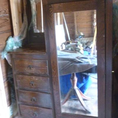 Antique wardrobe chest of drawers with mirrors, on
