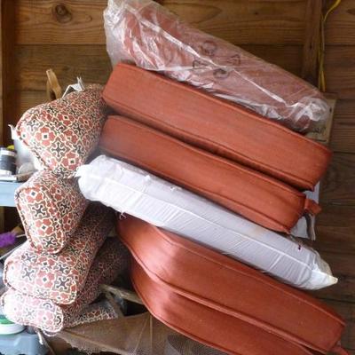 Box lot of outdoor seat cushions
