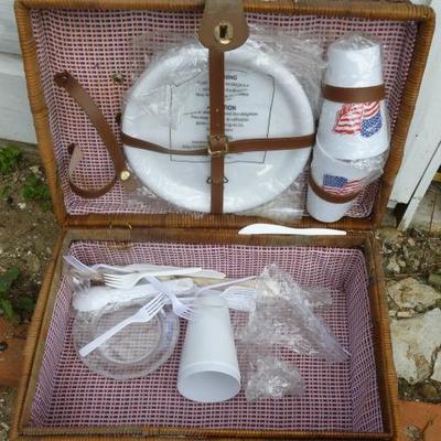 Vintage picnic basket with accessories
