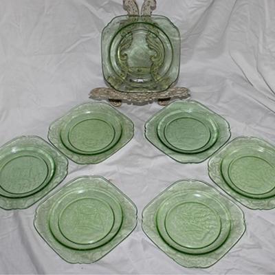 Seven green square depression glass plates
