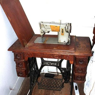 Antique Singer sewing machine desk with newer marr
