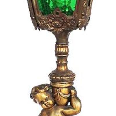 Antique lamp with cherub and green glass shade
