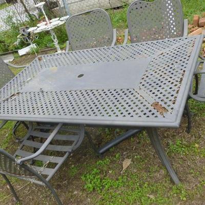 Metal outdoor table with 6 chairs
