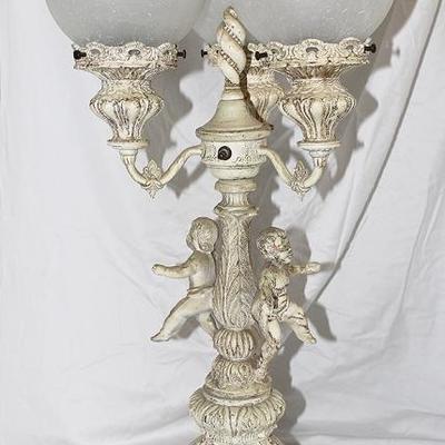 Three light French style lamp with figures
