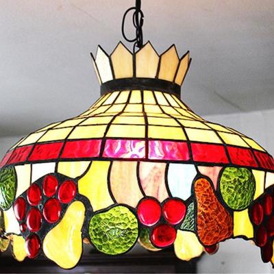 Glass hanging light fixture with fruit motif

