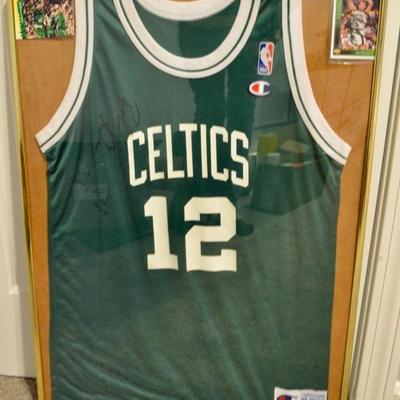 Celtics jersey autographed by Dino Radja and Pervis Ellison