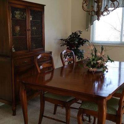 1940's Dining Table w/1 leaf and 6 Cloth covered Chairs.Table Folds down to small side table