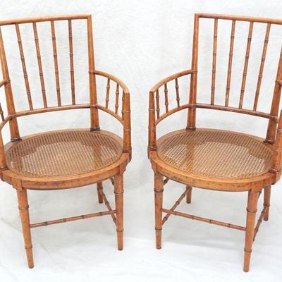 Matched Pair of Mid 20th c. Faux Painted  Bamboo and Cane Seat Arm Chairs. In very good condition. Each measures 21