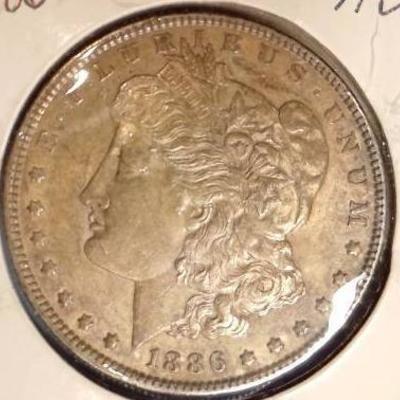 AU 1886 Morgan Silver Dollar