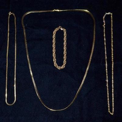 Gold necklaces ad bracelet