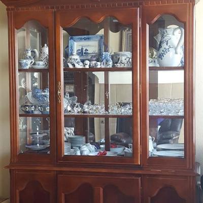 $250 Cherry China Cabinet. Light inside. Make a reasonable offer.