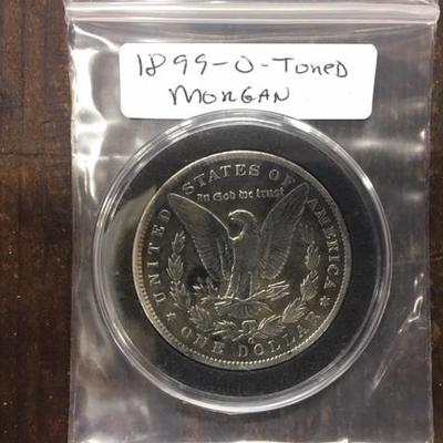 1899-O Toned Morgan Silver Dollar